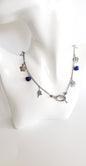 Collar en Acero Inoxidable con Encantadores Dijes de Flores y Corazones. - K.Beloved LLC