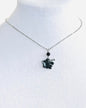 Collar en Acero Inoxidable , con Colgante en Resina color negro Flor Maga - K.Beloved LLC