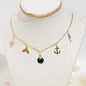 Collar en Acero Inoxidable con Dijes Playeros en colores negros y dorados - K.Beloved LLC